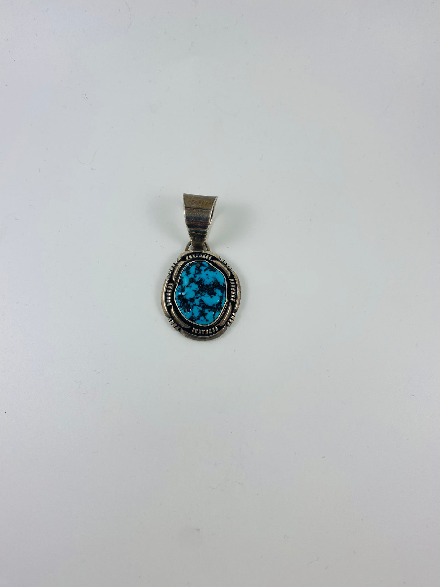 Sterling Silver Leo Yazzie Turquoise Pendant